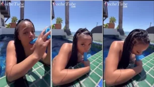 Lola coquetea con chupar un consolador en la piscina