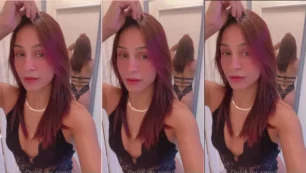 ¡Lessa Silva de Calcinha Black admirando en el espejo, gato