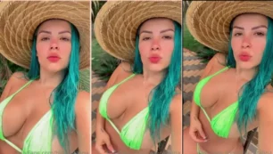¡Blue Catalina Cat, lleno de curvas y con un sombrero elegante, está tocando en la exposición