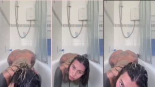 Camila Serna, el gato lleno de tatuajes, disfrutando de un delicioso baño