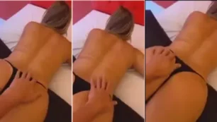 Rubia culona levantando el culo con tanga negra muy ajustada